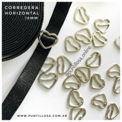 CORREDERA CORAZON HORIZONTAL 10MM ZAMAC NIQUEL PARA BRETEL DE CORPIÑO - 100 UN.